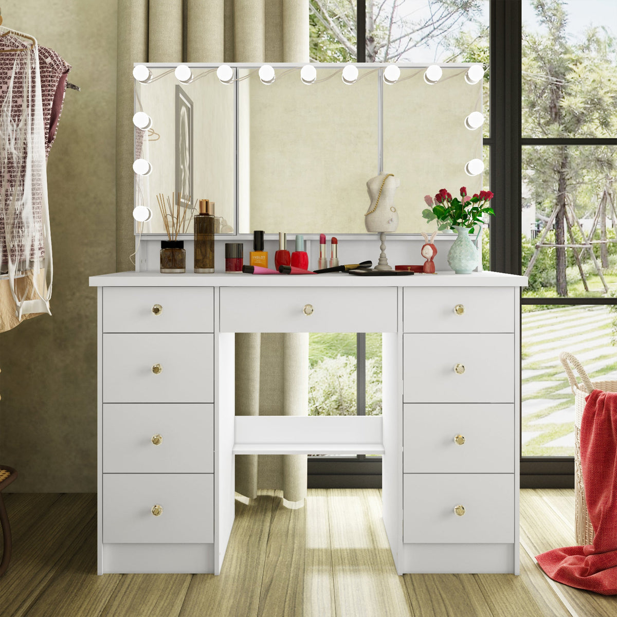 White makeup dressing table with lighted tri-fold mirror and nine drawers