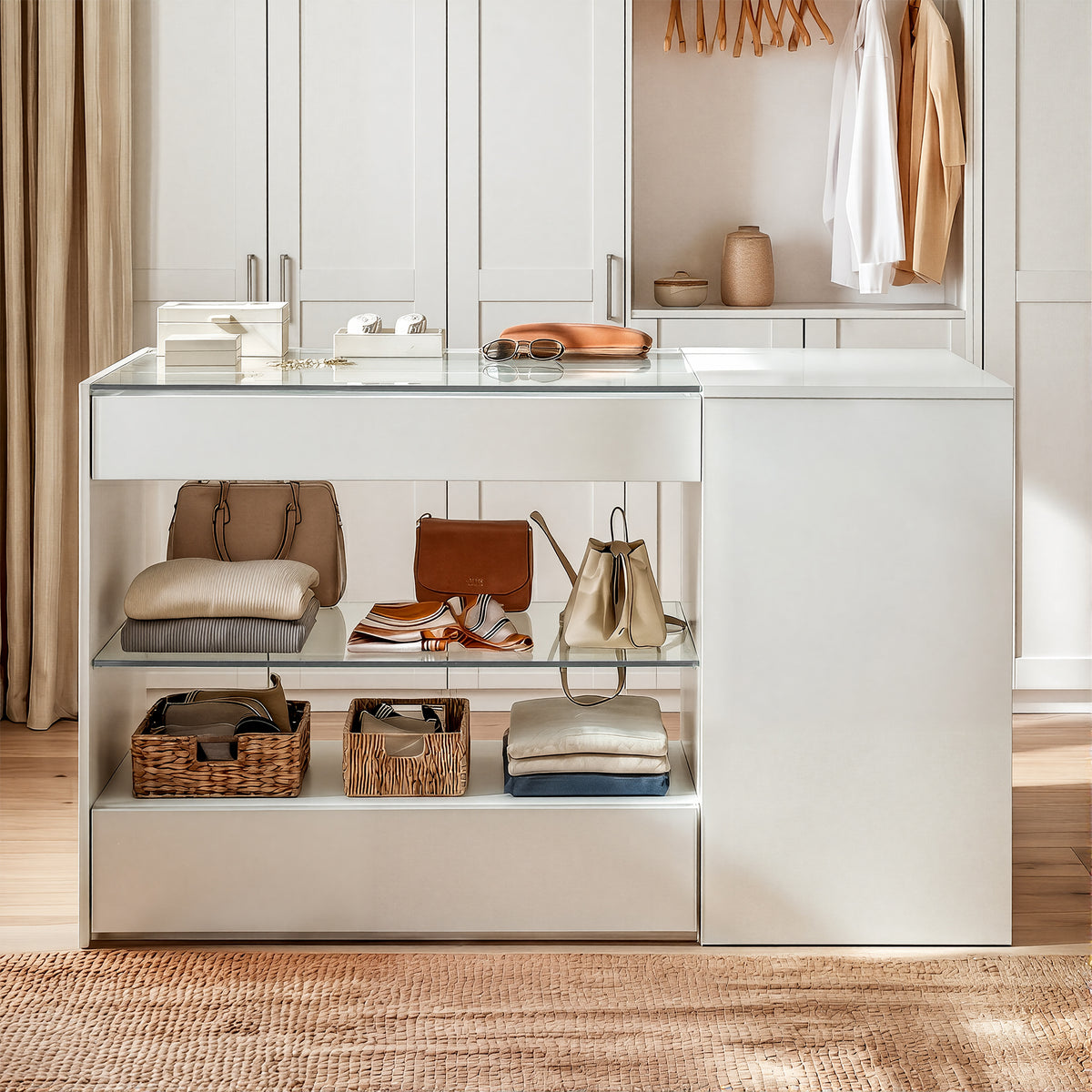 White closet island with a tempered glass top over jewelry display drawers