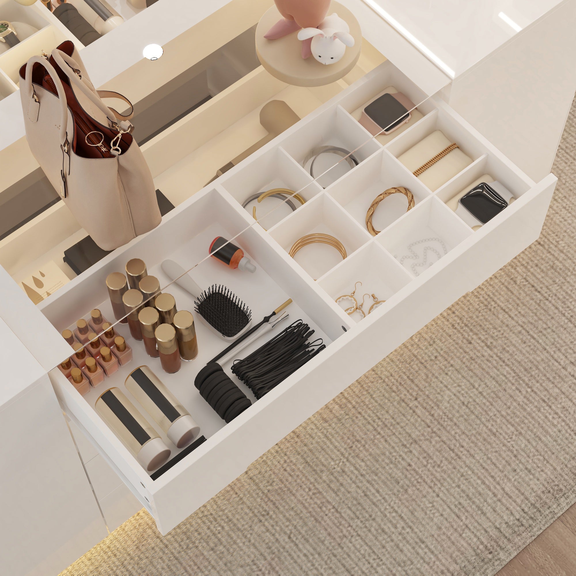 Open drawer with various beauty products including hairbrushes, bottles, and small items on a carpeted floor.