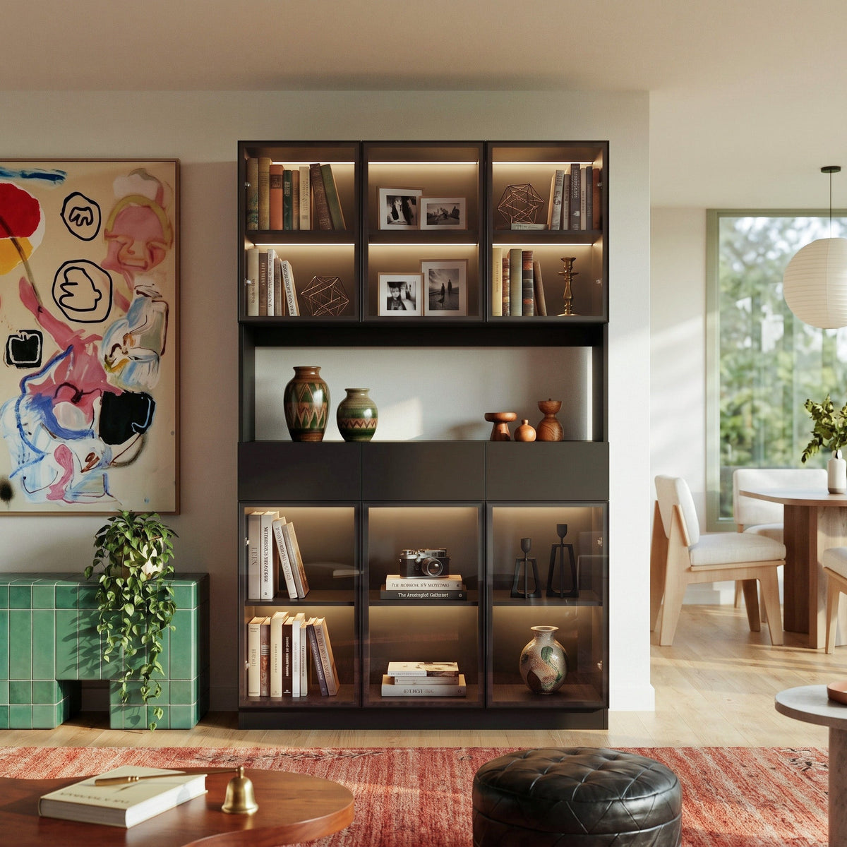 Varda 47-inch black display cabinet with LED lights and glass doors anchored against a wall