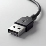Close-up of a USB cable on a light gray background